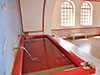 Теплый релаксационный бассейн в античных общественных термах с реконструированной системой нагрева и подачи воды