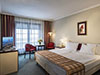 Спальня апартаментов отеля Danubius Health SPA Resort Aqua**** на термальном курорте Хевиз