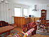 Гостиная с кухонным уголком и столовой в больших апартаментах ботеля Gracia*** в Братиславе