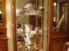 Витрина с исторической серебряной посудой в фойе отеля Stefanie 4**** в Вене