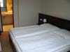 Спальня апартаментов отеля Grandhotel**** на курорте Ясна в Низких Татрах