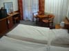 Нижняя спальня двухуровневых апартаментов отеля Grandhotel**** на курорте Ясна в Низких Татрах